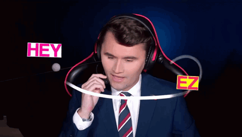 Man in Suit Wearing Headphones Saying Hey Don't Say That