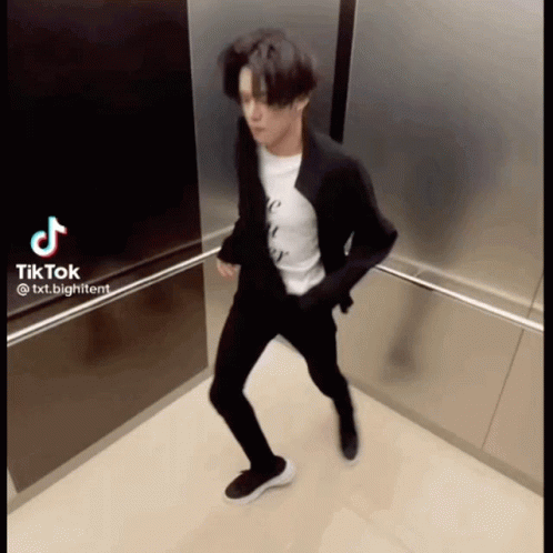 Man in Suit White Shirt Dancing Elevator TikTok
