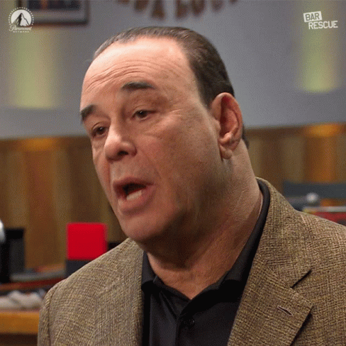 Man in Suit With Bar Rescue Text