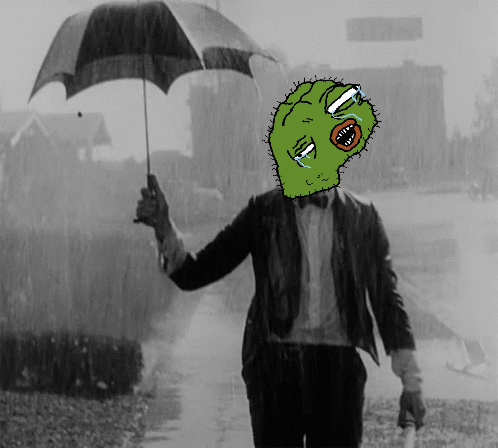 Man in Suit with Cactus Face Holding Umbrella