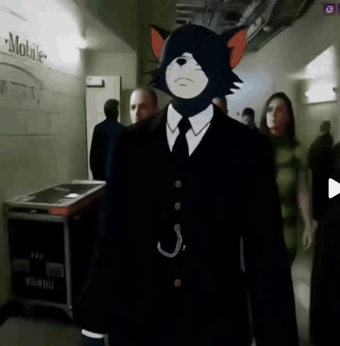 Man In Suit With Cat On Head Walking Past Mobile Sign GIF