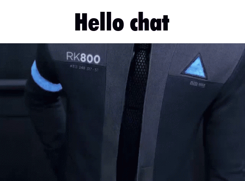 Man in Suit With Hello Chat on Jacket