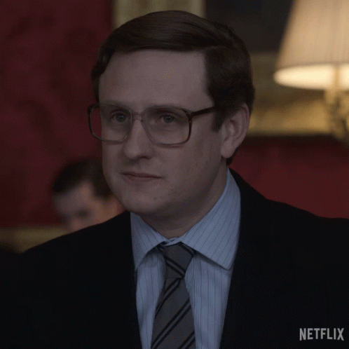 Man in Suit with Netflix Logo