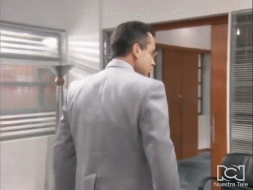 Man In Suit With Nuestra Tele GIF