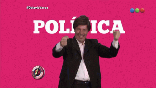 Man in Suit With Política Sign