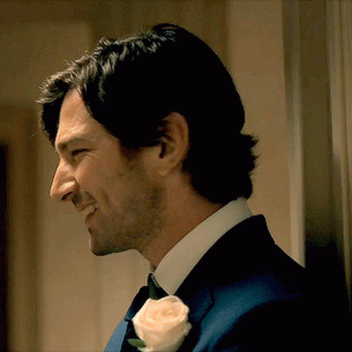 Man In Suit With Rose In Lapel GIF