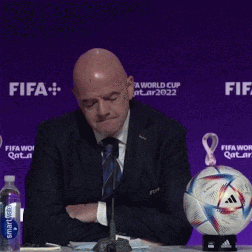 Man in Suit with Soccer Ball Says Today I Feel