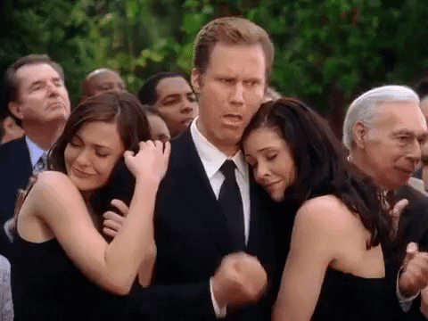 Man in Suit with Two Women in Black Dresses Funeral