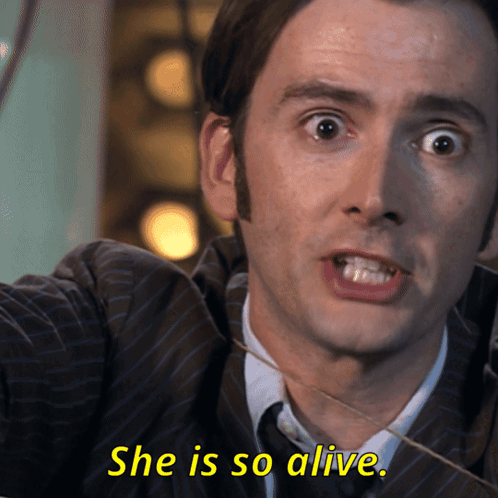 Man in Suit Yellow She Is So Alive