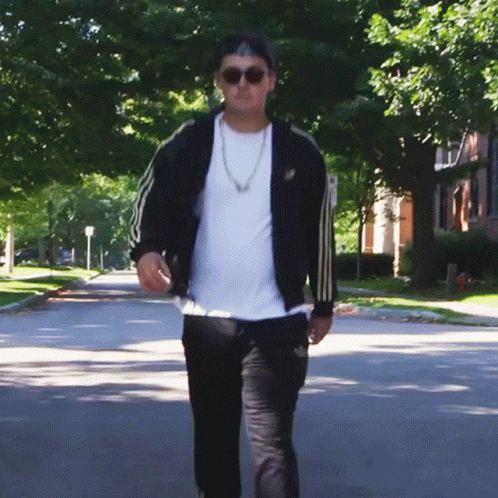 Man In Sunglasses And Black Adidas Jacket Walking GIF