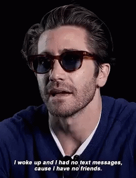 Man in Sunglasses and Blue Sweater Saying No Friends