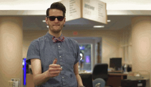 Man In Sunglasses And Bow Tie With Answering Machine GIF