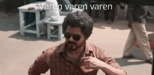 Man In Sunglasses And Brown Shirt In Front Of Group GIF