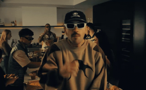 Man in Sunglasses and California Hat