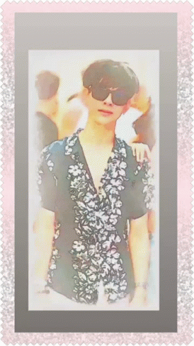 Man in Sunglasses and Floral Shirt