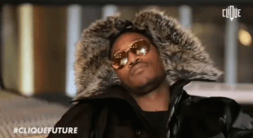 Man in Sunglasses and Fur Hood