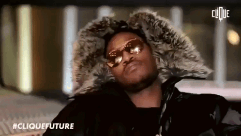 Man in Sunglasses and Fur Hood
