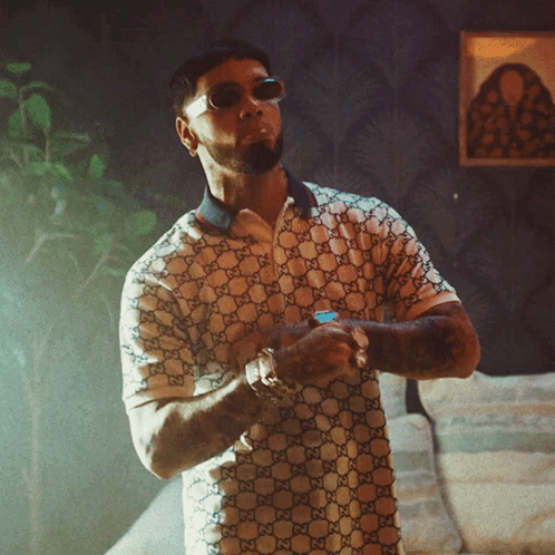 Man In Sunglasses And Gucci Shirt Checking Watch GIF