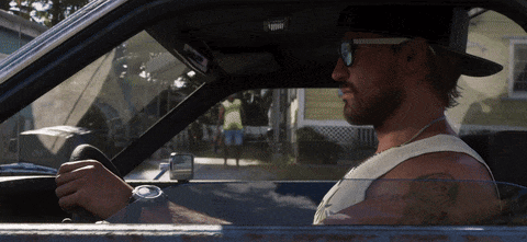 Man In Sunglasses And Hat Driving Car GIF