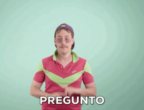 Man in Sunglasses and Hat Pointing Up Pregunto