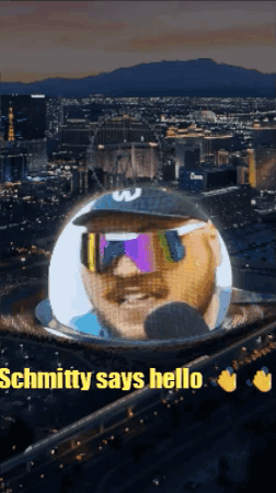 Man in Sunglasses and Hat Schmitty Says Hello