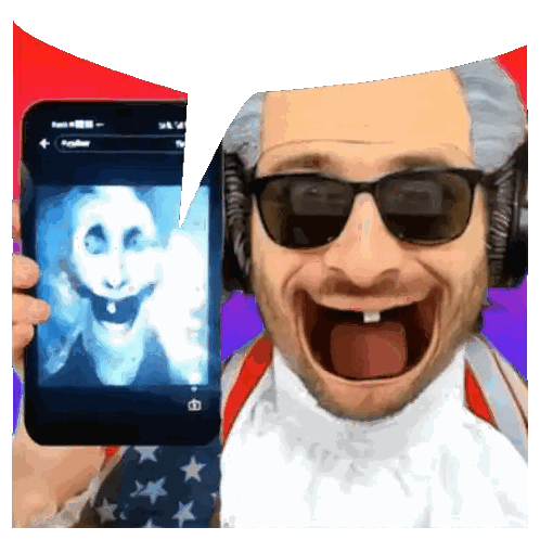 Man in Sunglasses and Headphones Holding Phone