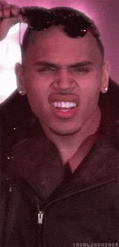Man In Sunglasses And Jacket Making Funny Face GIF