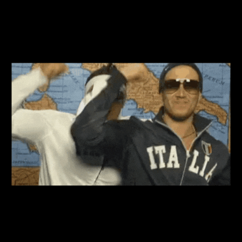 Man in Sunglasses and Jacket Saying Italia