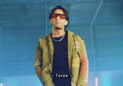 Man in Sunglasses and Jacket Saying Toree