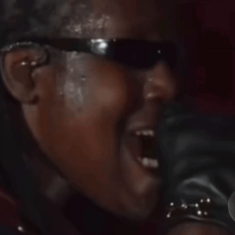 Man in Sunglasses and Leather Glove