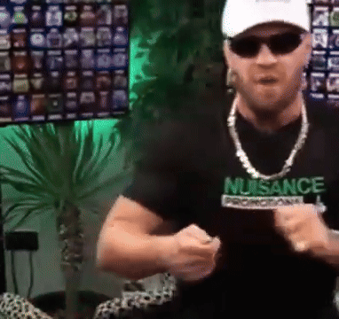 Man In Sunglasses And Nusance Shirt Dancing GIF