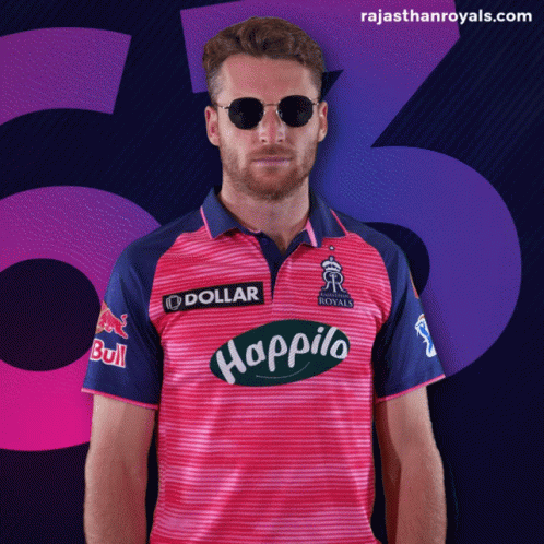 Man in Sunglasses and Pink Happilo Shirt