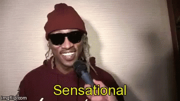 Man in Sunglasses and Red Beanie Saying Sensational