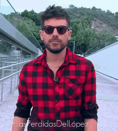 Man in Sunglasses and Red Black Plaid Shirt