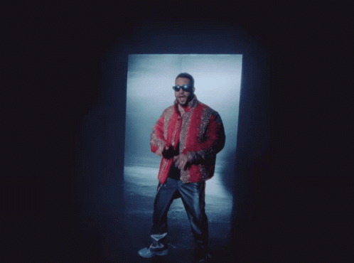Man in Sunglasses and Red Jacket