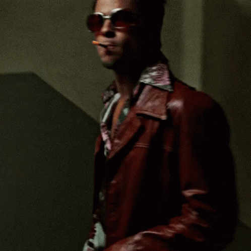 Man In Sunglasses And Red Leather Jacket Smoking Cigarette GIF