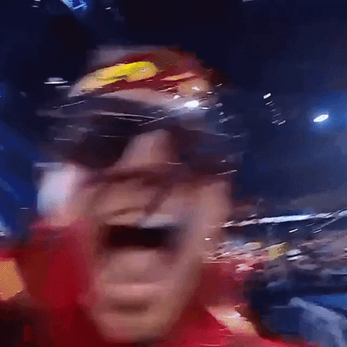 Man in Sunglasses and Red Shirt