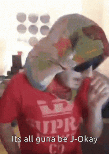 Man in Sunglasses and Red Shirt Saying Supra