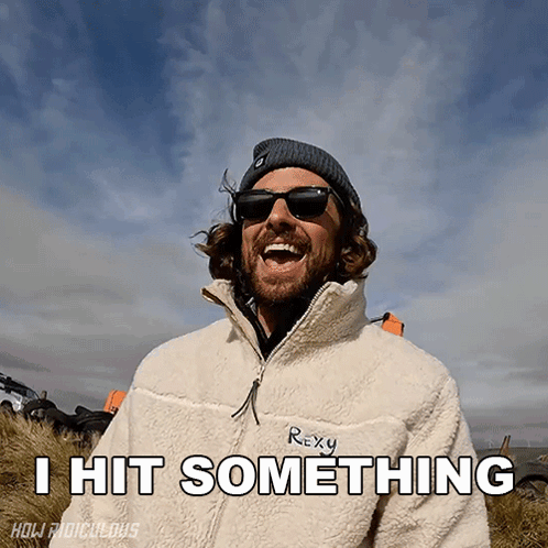 Man in Sunglasses and Rexy Jacket Saying I Hit Something