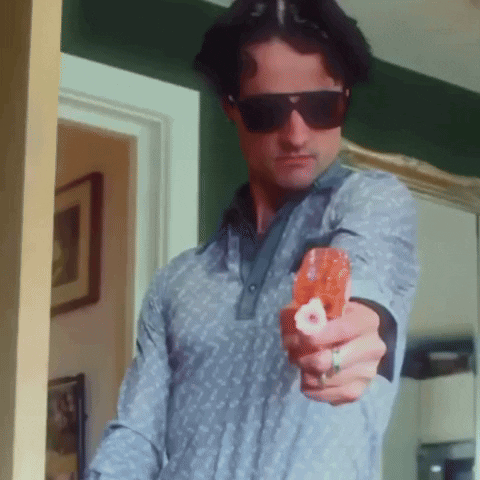 Man In Sunglasses And Ring Pointing Gun At Camera GIF