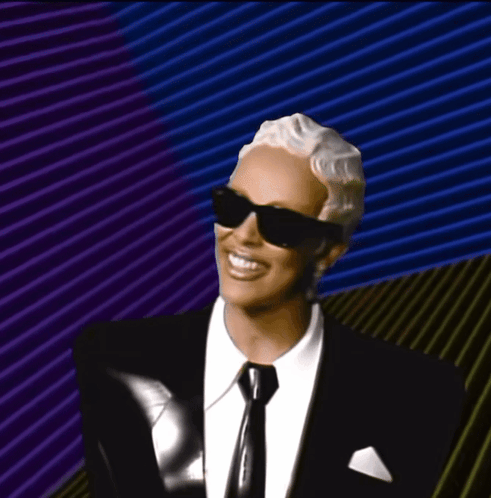 Man In Sunglasses And Suit Smiling GIF