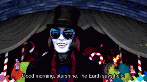 Man in Sunglasses and Top Hat Says Good Morning Starshine