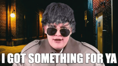 Man in Sunglasses and Trench Coat Says I Got Something For Ya