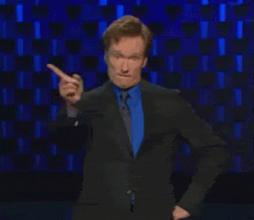 Man In Sunglasses And Watch Sitting On Bed GIF