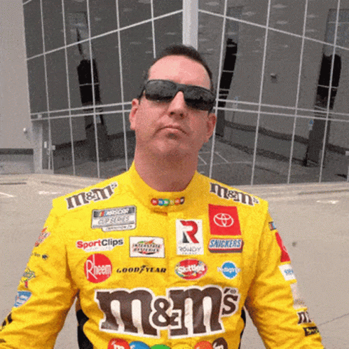 Man in Sunglasses and Yellow M&Ms Uniform