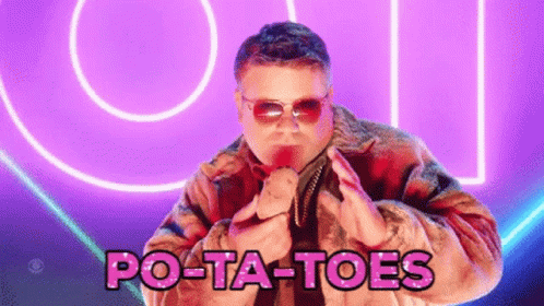 Man in Sunglasses Holding Potato by Potato Toes Sign