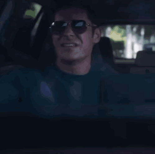 Man in Sunglasses in Car Says I Can Feel Something Inside Me