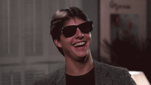 Man in Sunglasses Laughing Smiling