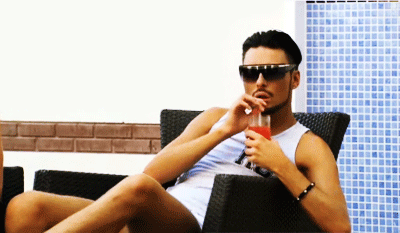 Man in Sunglasses Legs Crossed
