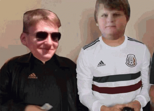 Man in Sunglasses Next to Boy in Adidas Jersey